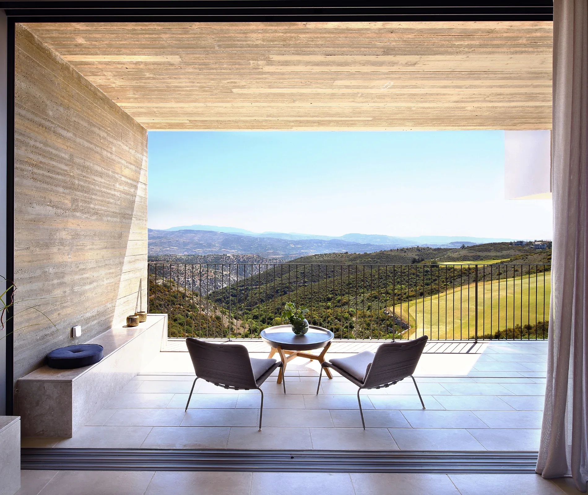 A Minthis residence interior opening onto the resort landscape